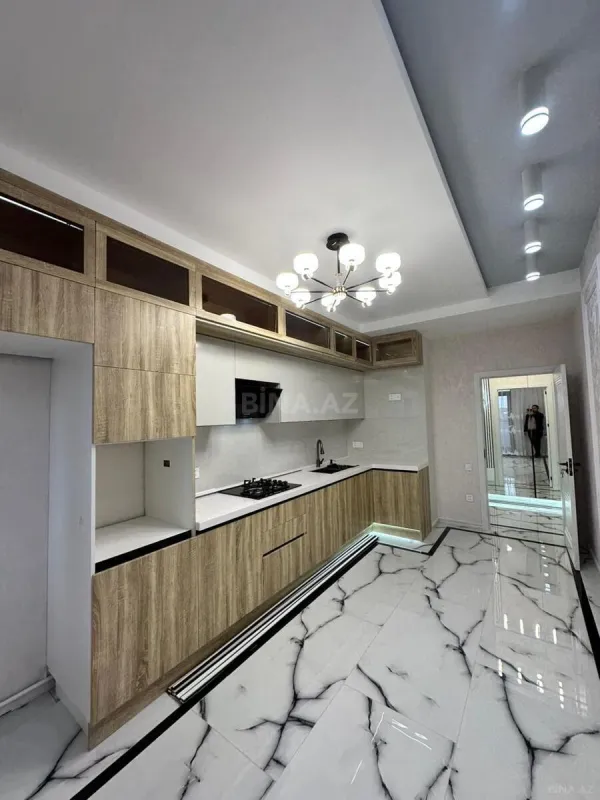 Satılır 3 otaqlı mənzil 119 m²