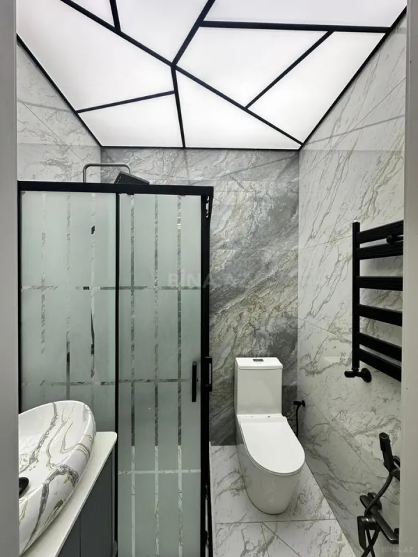 Satılır 4 otaqlı mənzil 136 m²