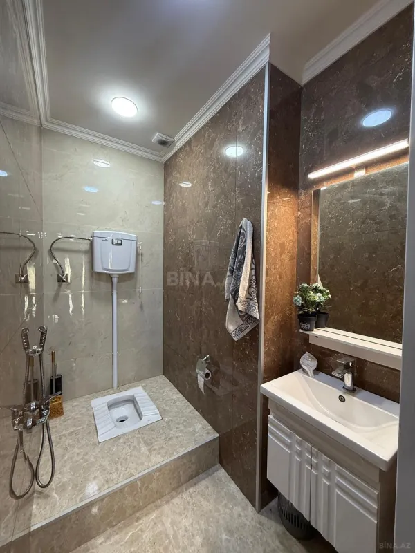 Satılır 4 otaqlı mənzil 144 m²