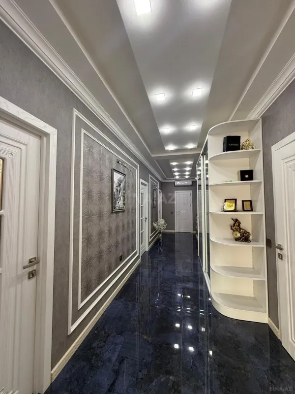 Satılır 4 otaqlı mənzil 144 m²