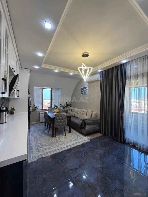 Satılır 4 otaqlı mənzil 144 m²