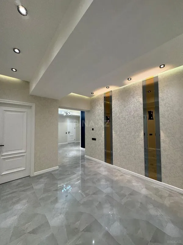 Satılır 4 otaqlı mənzil 165 m²