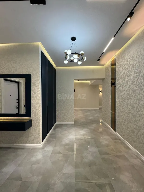 Satılır 4 otaqlı mənzil 165 m²