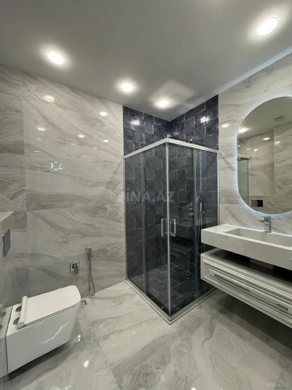 Satılır 4 otaqlı mənzil 165 m²