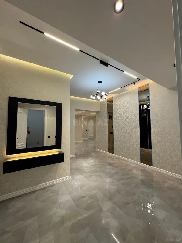 Satılır 4 otaqlı mənzil 165 m²