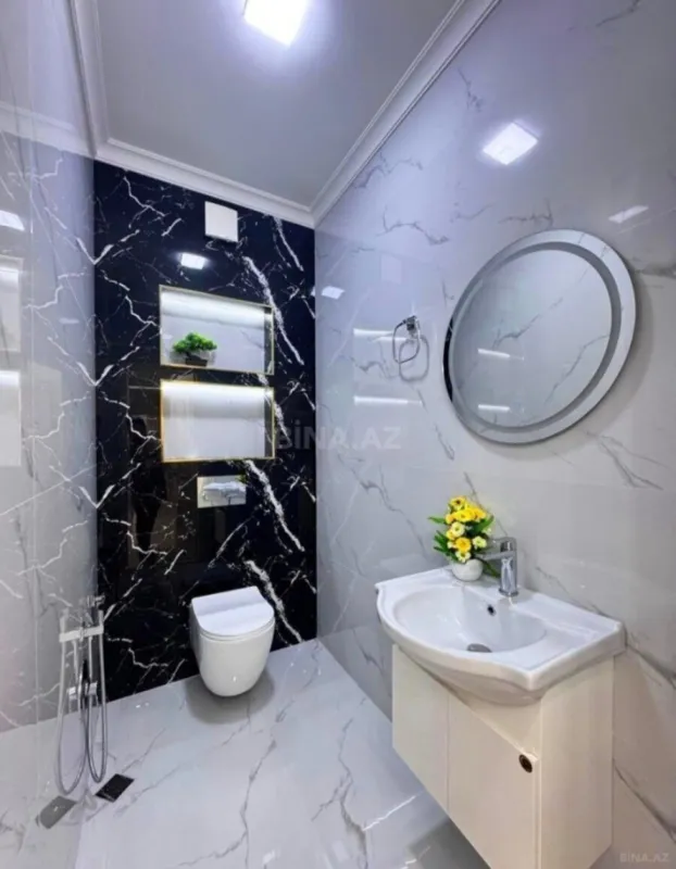 Satılır 4 otaqlı mənzil 140 m²