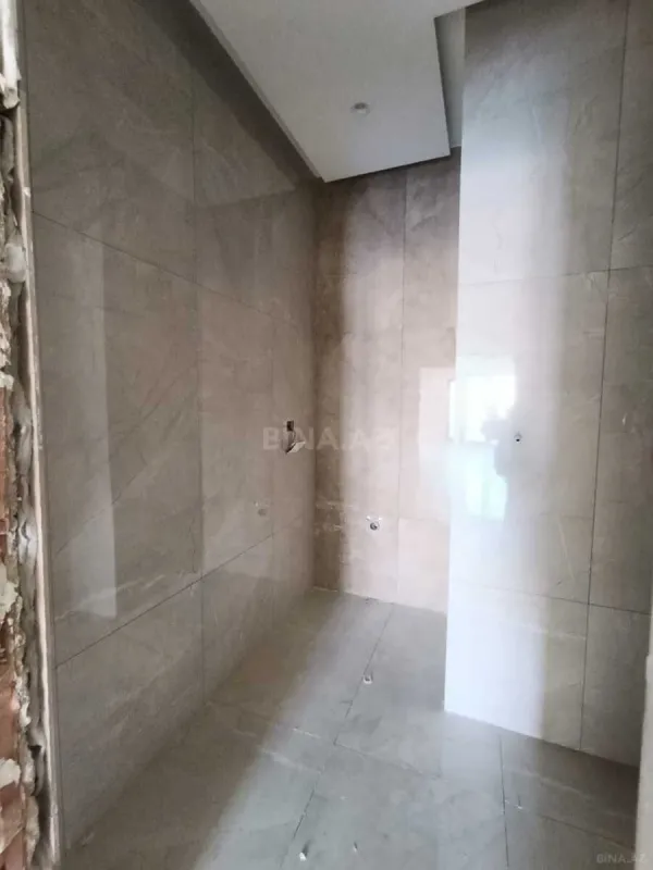 Satılır 3 otaqlı mənzil 157 m²