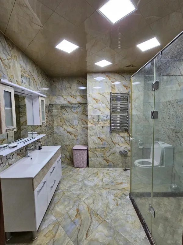 Satılır 4 otaqlı mənzil 202 m²