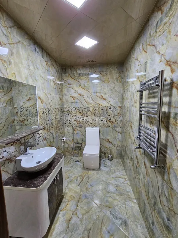 Satılır 4 otaqlı mənzil 202 m²