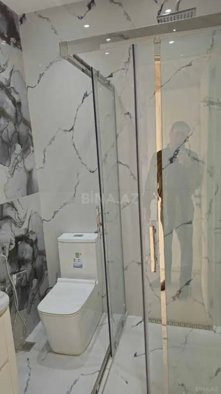 Satılır 4 otaqlı mənzil 145 m²