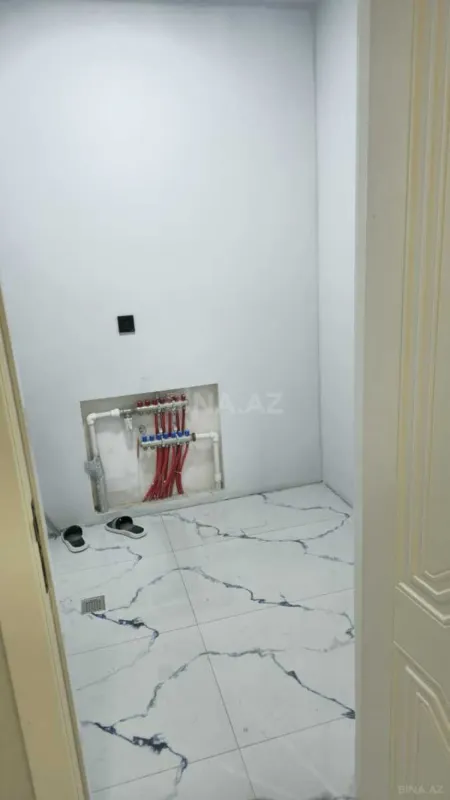 Satılır 4 otaqlı mənzil 145 m²