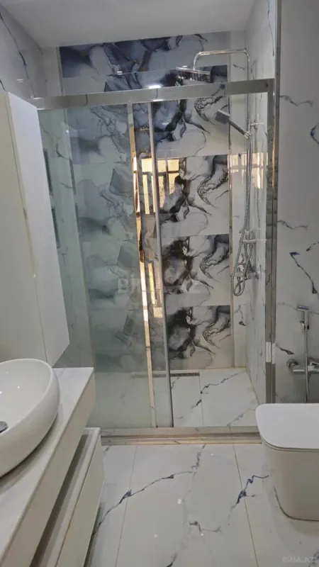 Satılır 4 otaqlı mənzil 145 m²