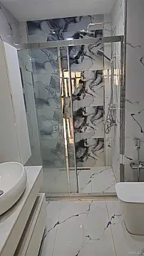 Satılır 4 otaqlı mənzil 145 m²