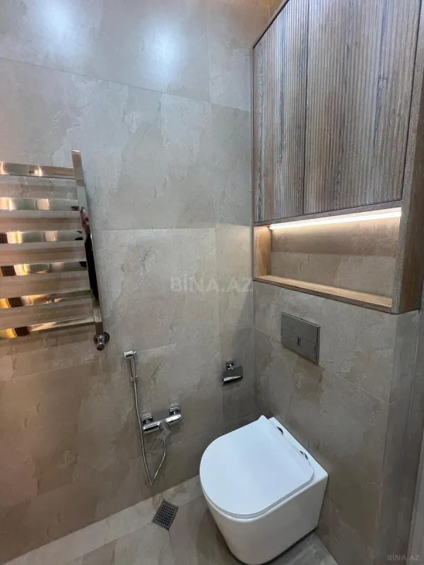 Satılır 4 otaqlı mənzil 145 m²