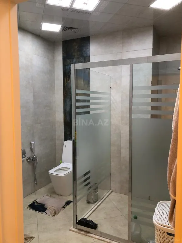 Satılır 4 otaqlı mənzil 202 m²