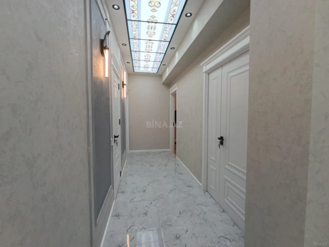 Satılır 4 otaqlı mənzil 153 m²