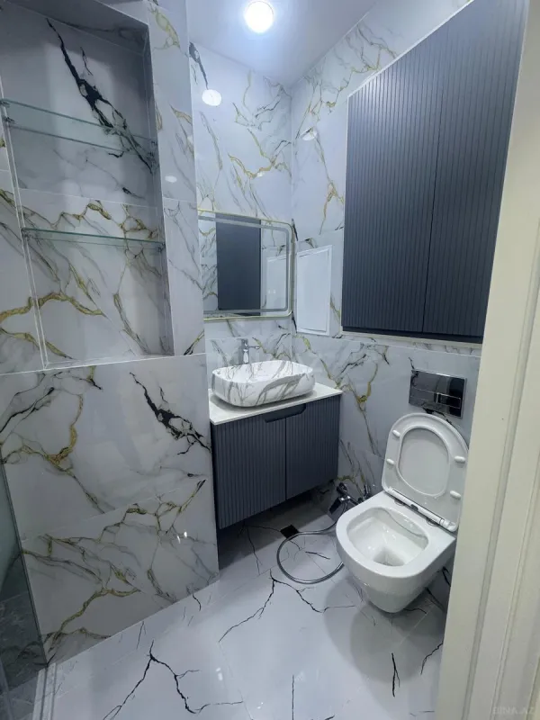 Satılır 2 otaqlı mənzil 77 m²
