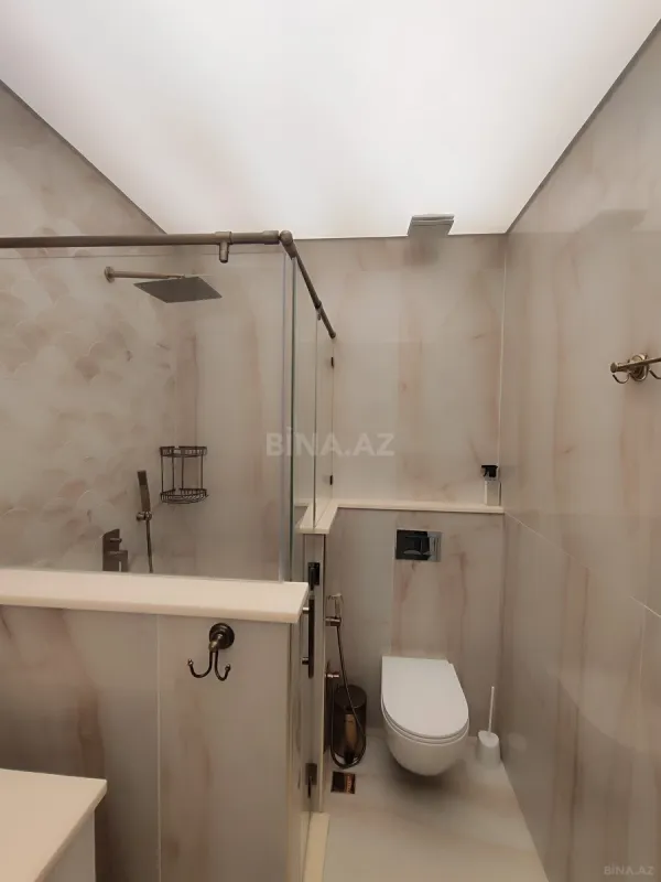 Satılır 4 otaqlı mənzil 211 m²