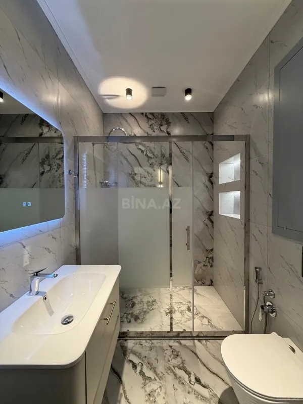 Satılır 4 otaqlı mənzil 118 m²