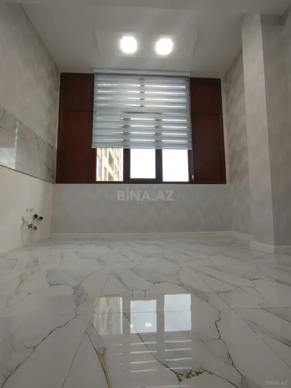 Satılır 4 otaqlı mənzil 103 m²