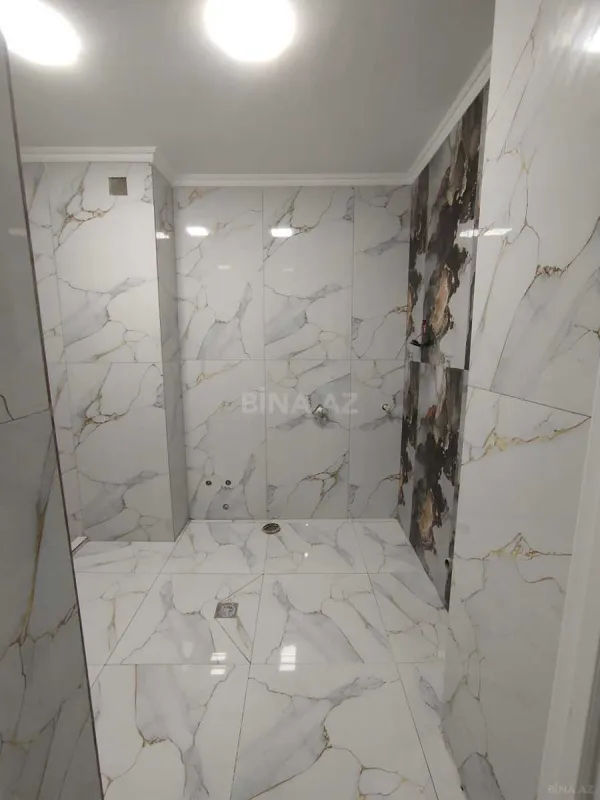 Satılır 4 otaqlı mənzil 103 m²