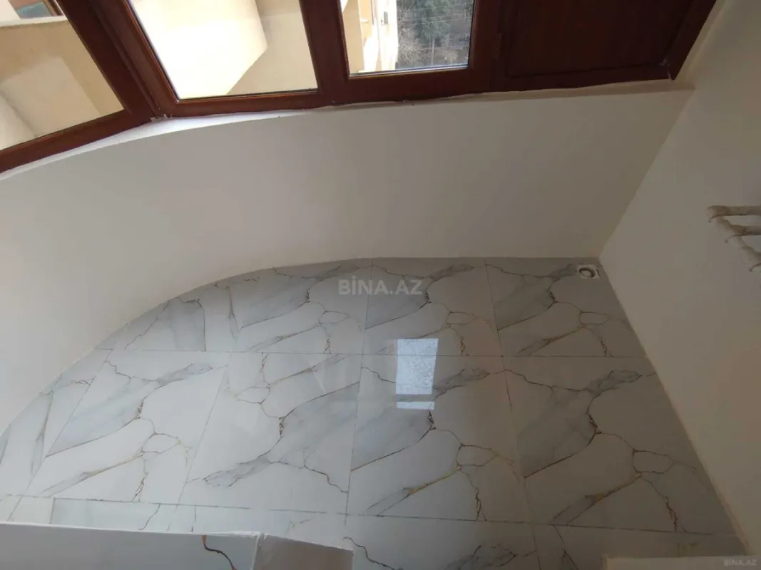 Satılır 4 otaqlı mənzil 103 m²