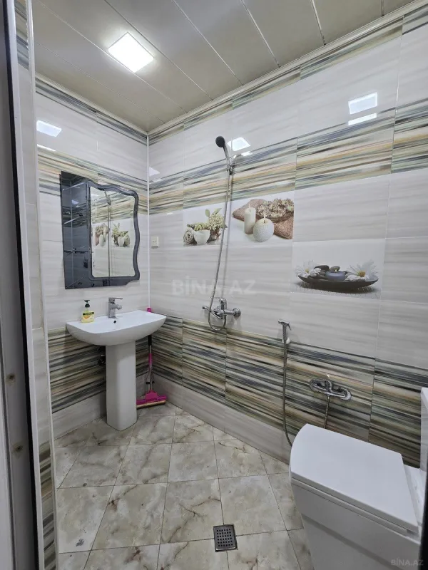 Satılır 4 otaqlı mənzil 115 m²