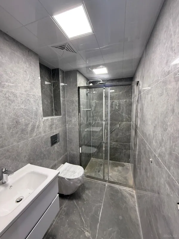 Satılır 4 otaqlı mənzil 107.7 m²