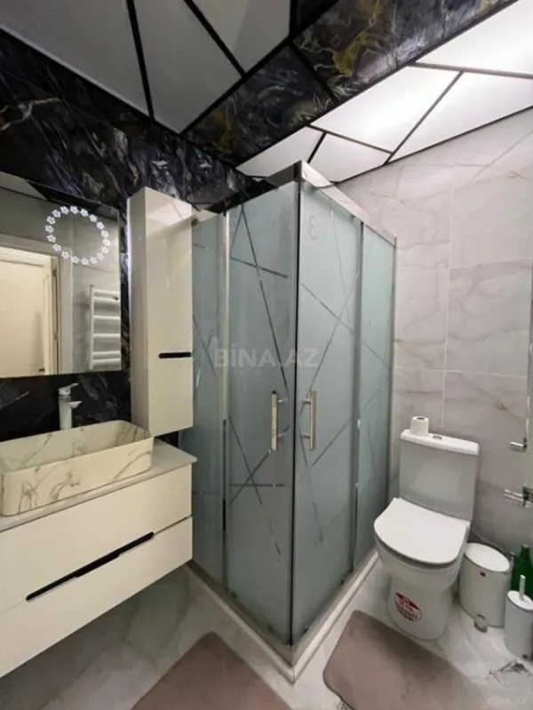 Satılır 4 otaqlı mənzil 142 m²