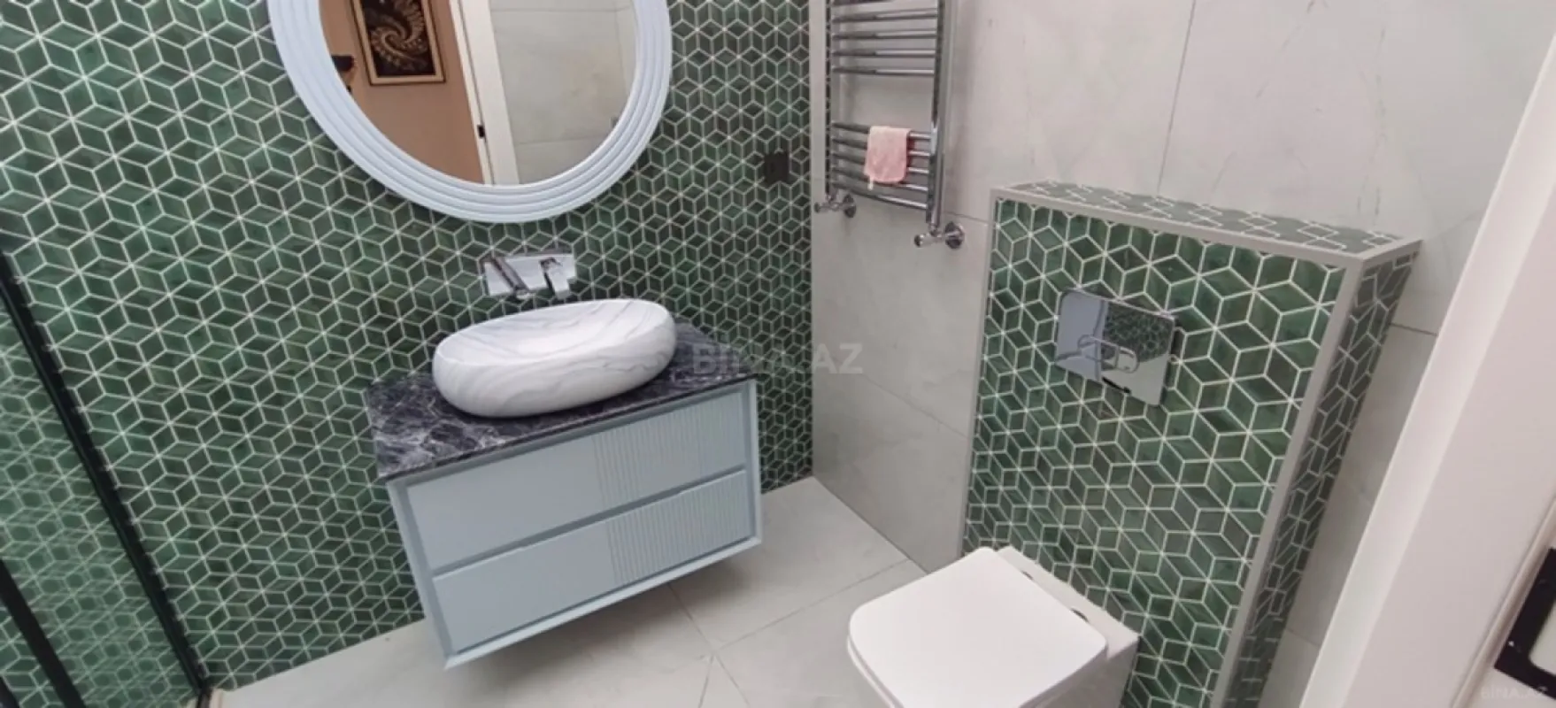 Satılır 3 otaqlı mənzil 131 m²