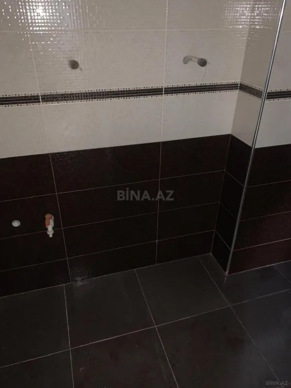 Satılır 4 otaqlı mənzil 237 m²