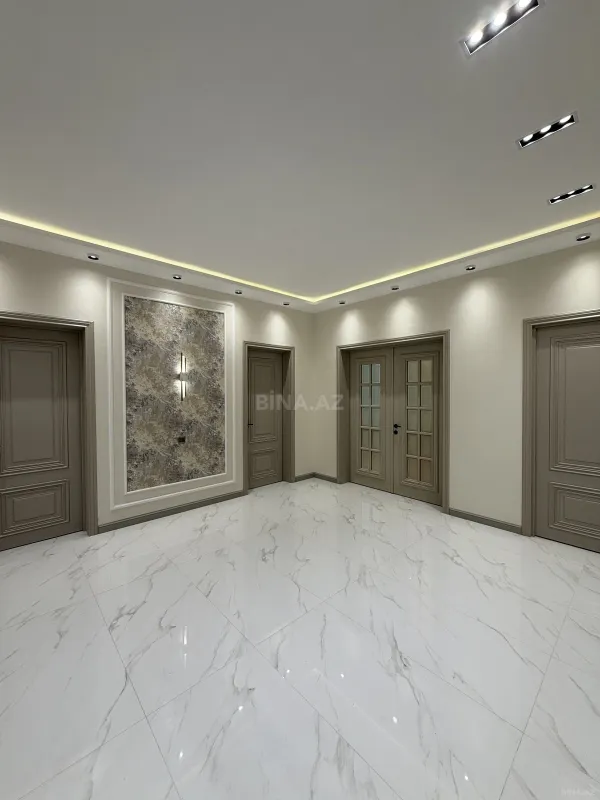 Satılır 3 otaqlı mənzil 141 m²