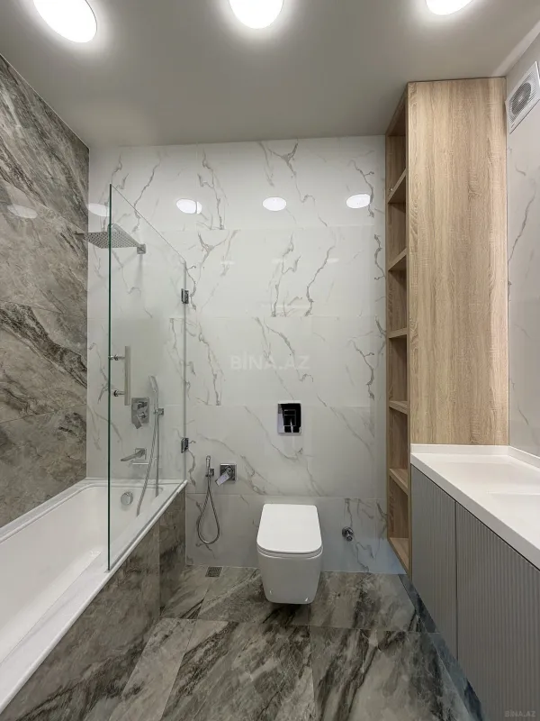 Satılır 3 otaqlı mənzil 141 m²