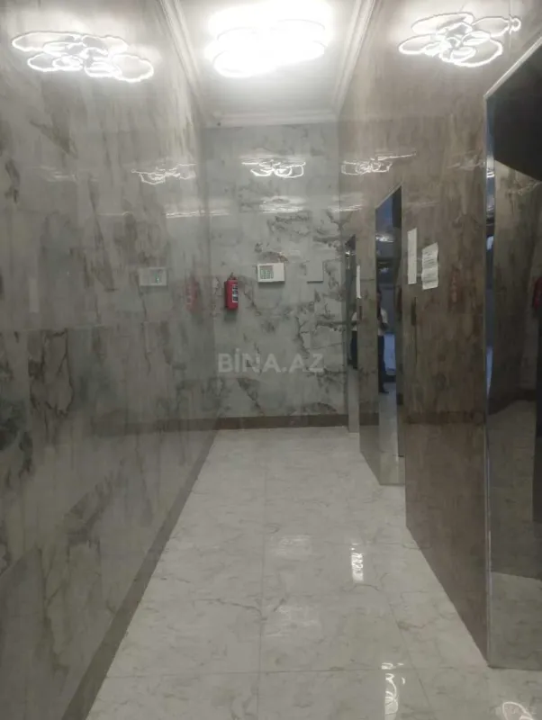 Satılır 4 otaqlı mənzil 164 m²