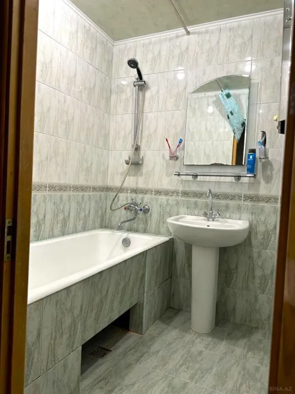 Satılır 4 otaqlı mənzil 115 m²