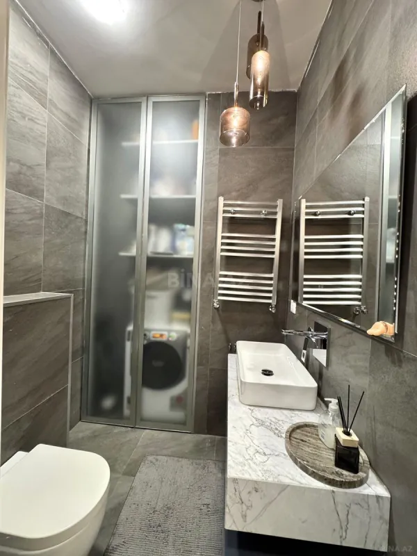 Satılır 4 otaqlı mənzil 200 m²