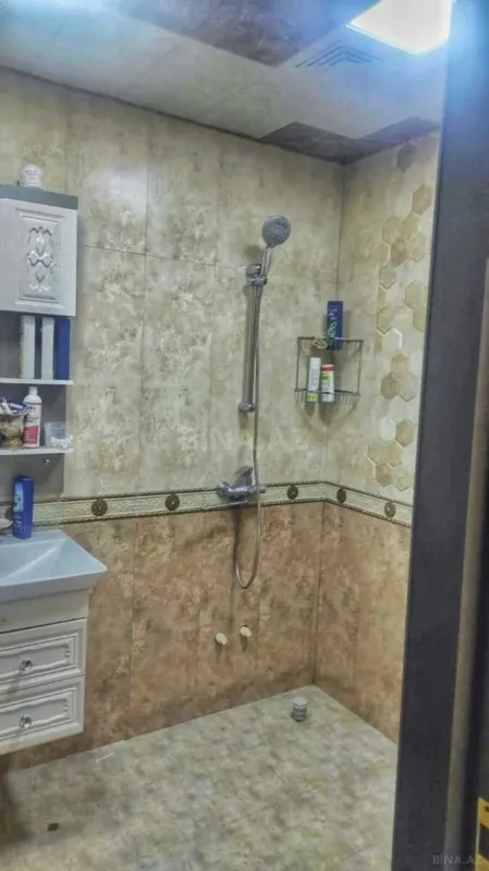 Satılır 4 otaqlı mənzil 125.6 m²