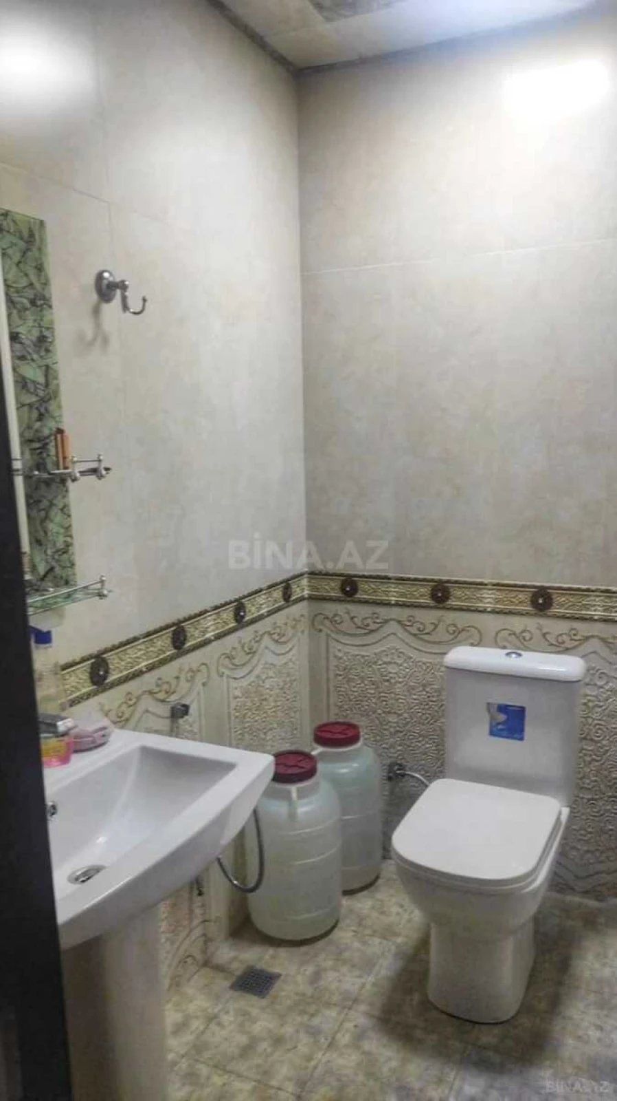Satılır 4 otaqlı mənzil 125.6 m²