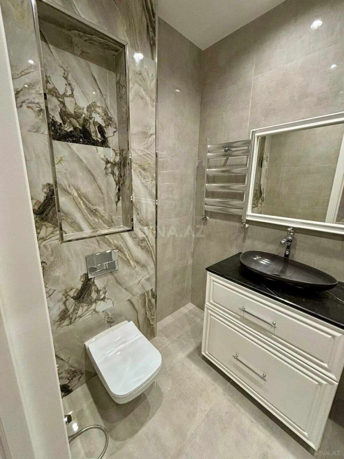 Satılır 3 otaqlı mənzil 100.7 m²