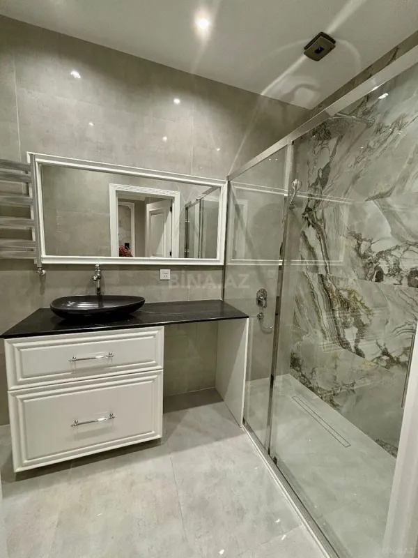 Satılır 3 otaqlı mənzil 100.7 m²