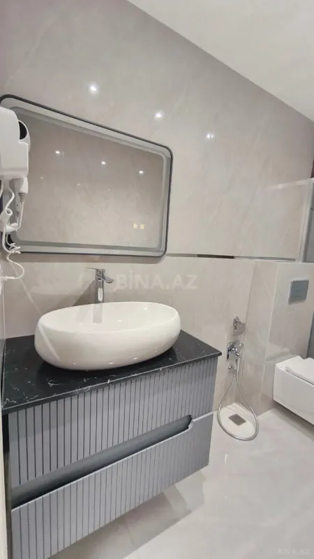 Satılır 3 otaqlı mənzil 128 m²