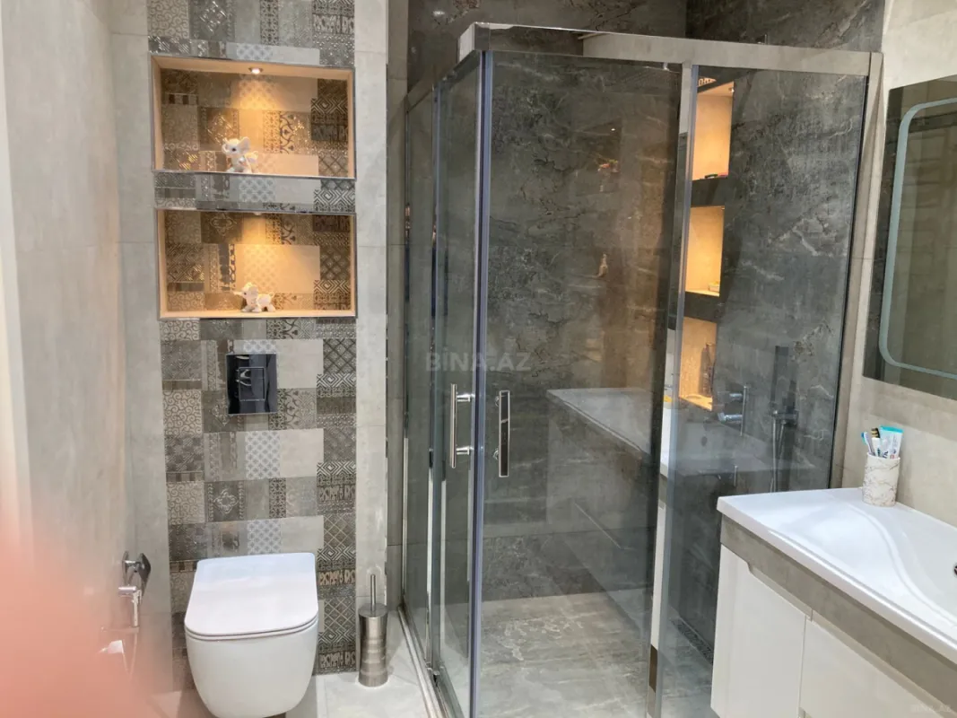 Satılır 4 otaqlı mənzil 165 m²
