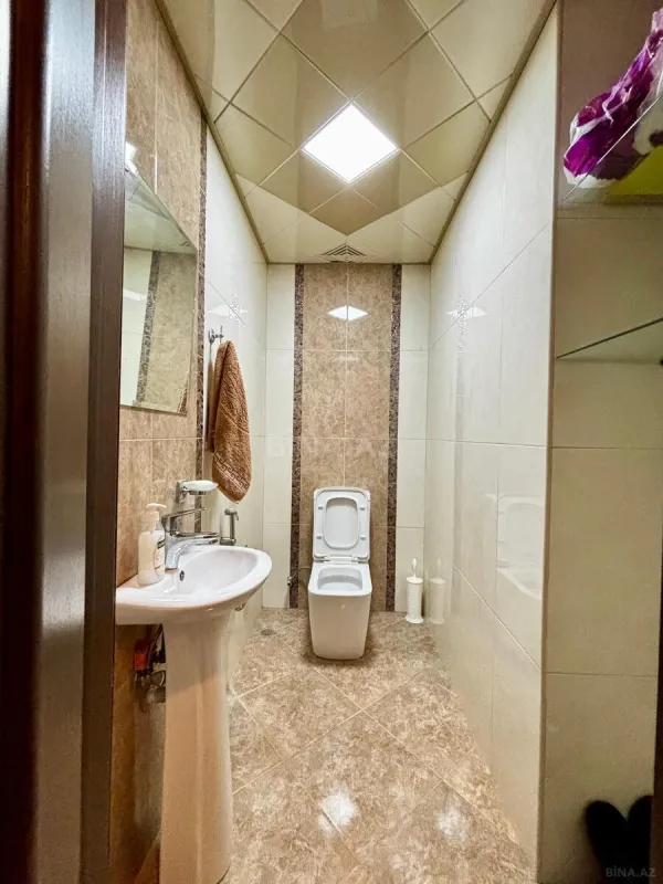 Satılır 4 otaqlı mənzil 157.7 m²