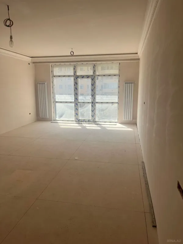 Satılır 4 otaqlı mənzil 201 m²