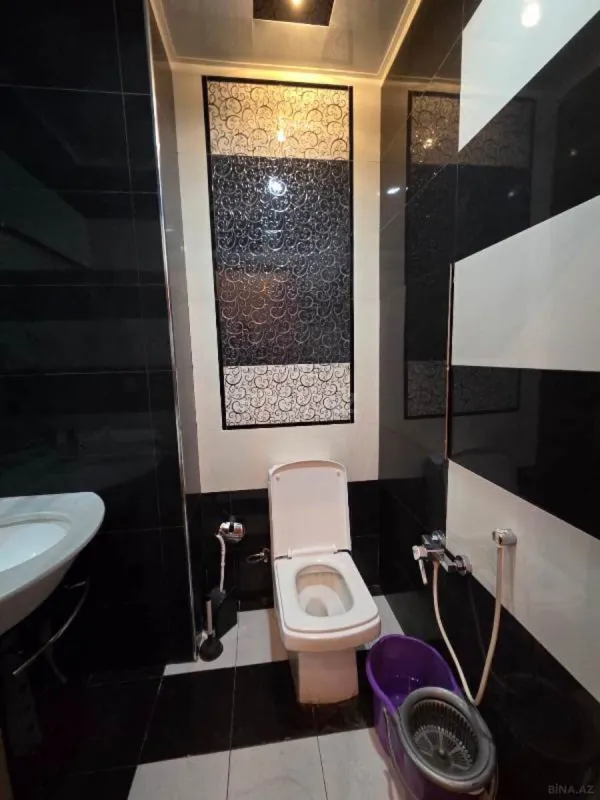 Satılır 4 otaqlı mənzil 221 m²
