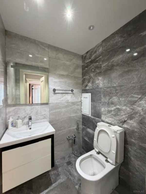 Satılır 4 otaqlı mənzil 146 m²