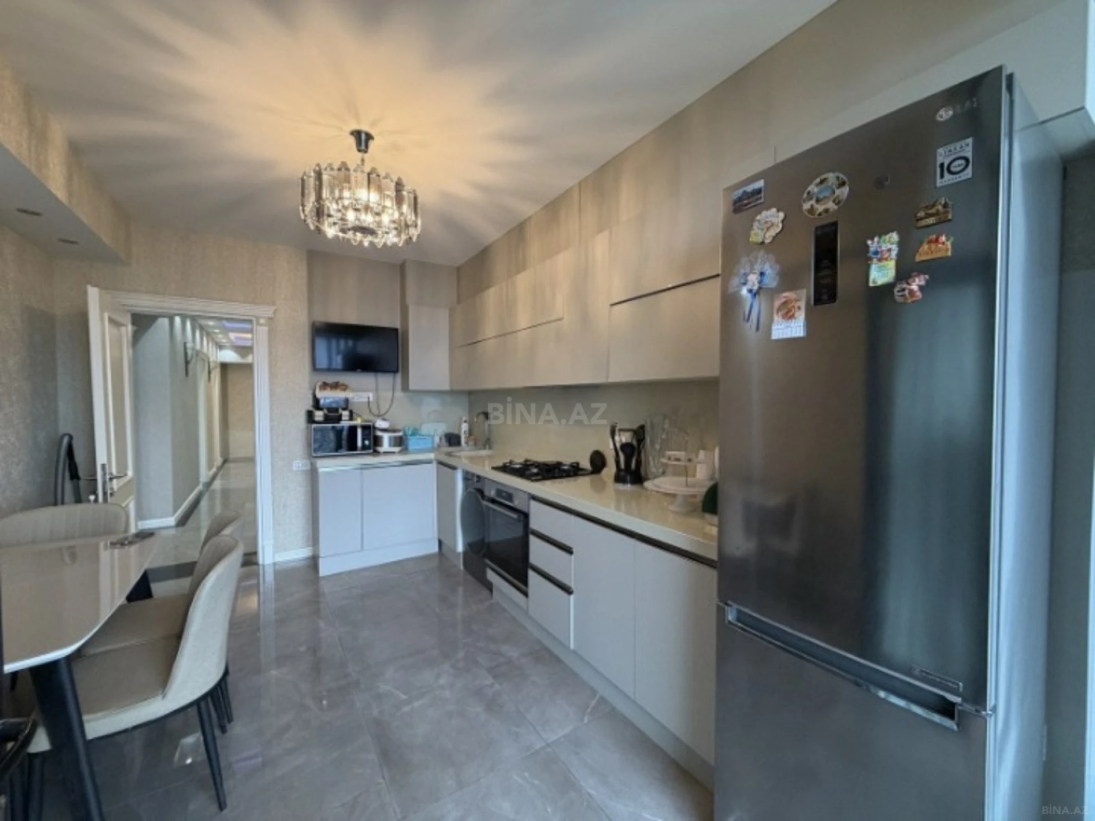 Satılır 4 otaqlı mənzil 146 m²