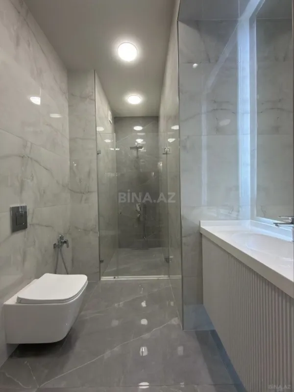 Satılır 3 otaqlı mənzil 141 m²