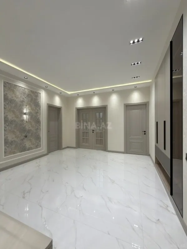 Satılır 3 otaqlı mənzil 141 m²