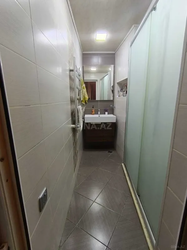 Satılır 4 otaqlı mənzil 140 m²